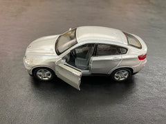 Masinuta metalica bmw x6 13cm scara 1 la 38, KINSMART - Publisol.ro
