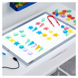 Set de sortare, Scoici translucide colorate, 72 piese, TickiT - Publisol.ro